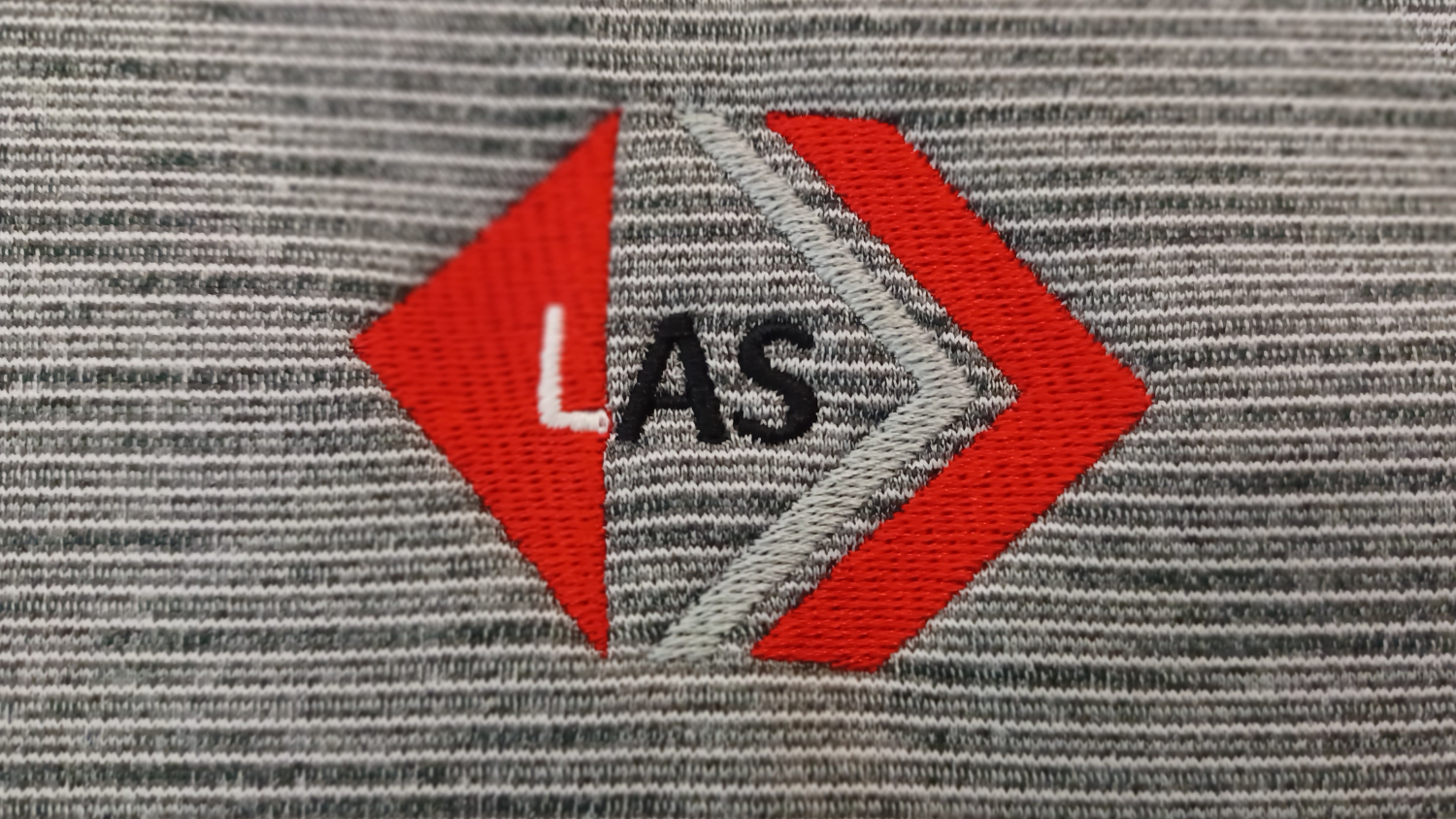 LAS logo on a sweater