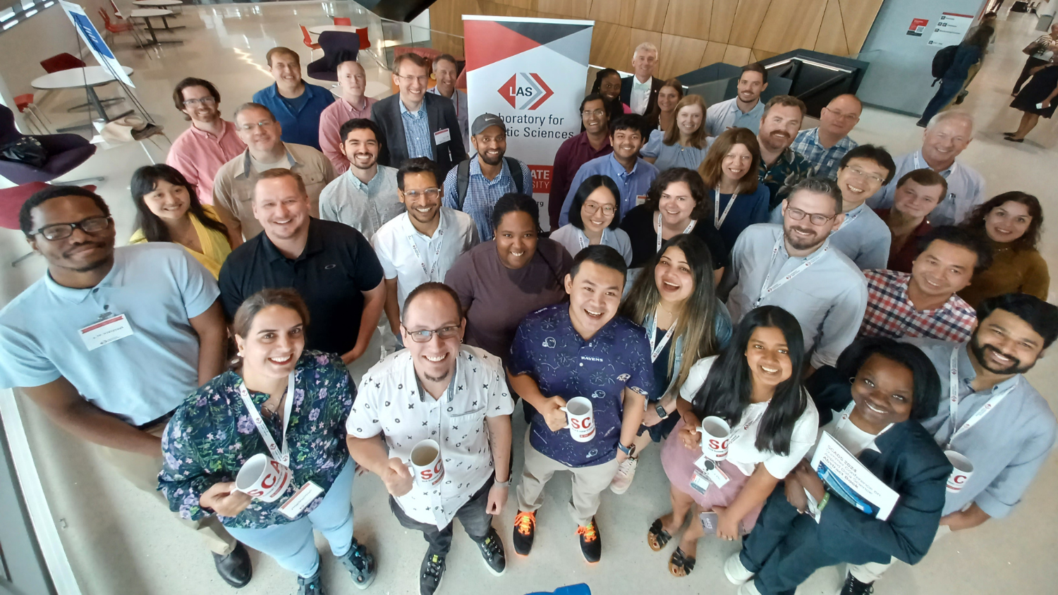 Group of 40 people smiling at the camera