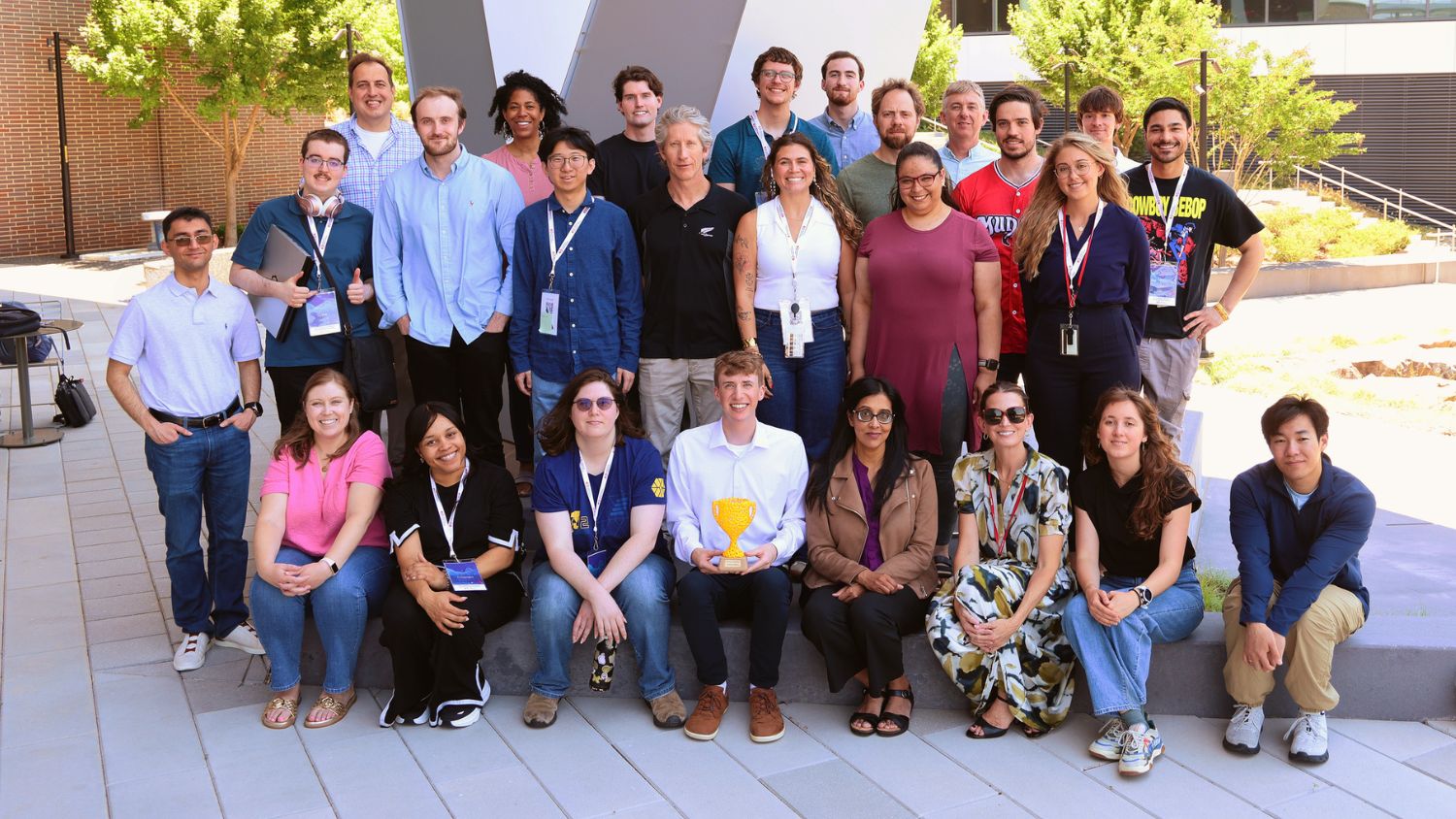 A group of SCADS participants pose outside Fitts-Woolard Hall at NC State.